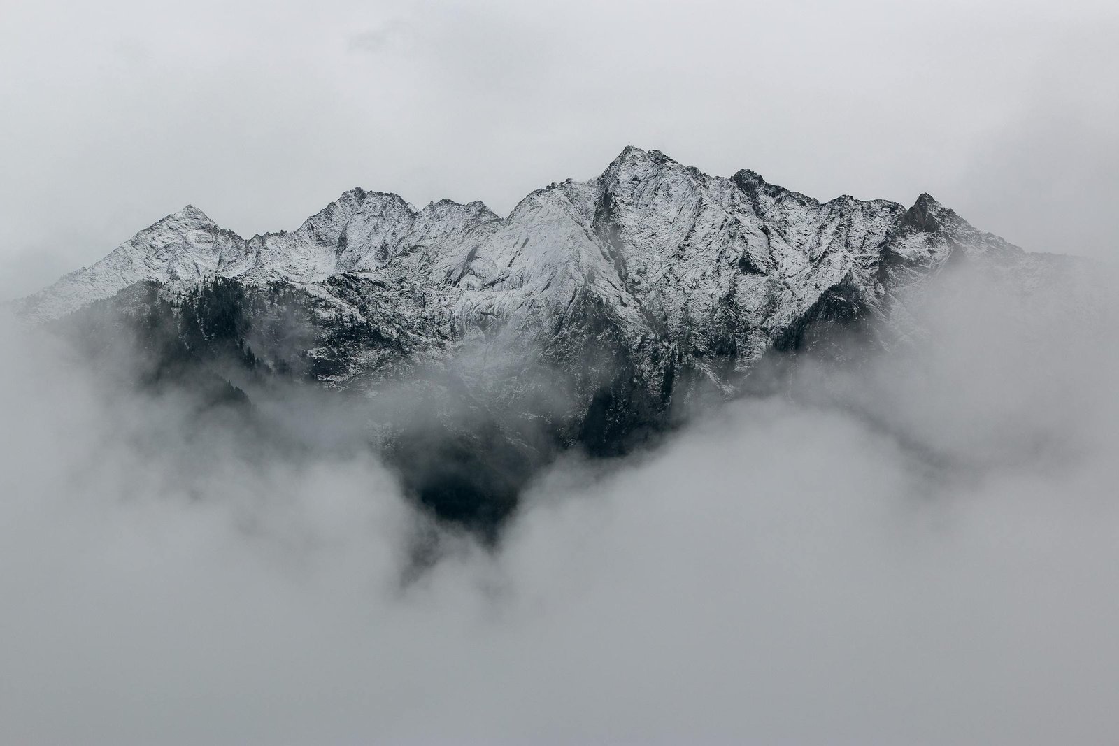 Alpine peaks in fog